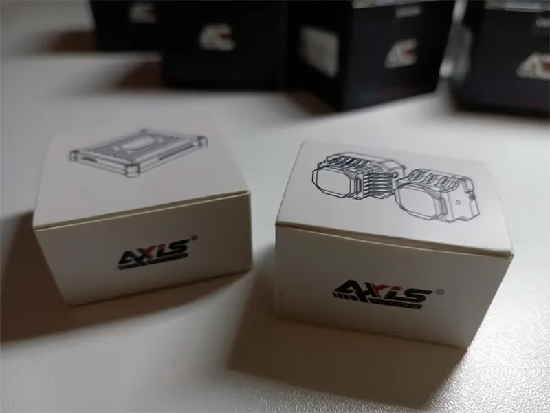 Защита AXIS для юнита DJI O4 AIR в заводской упаковке на столе